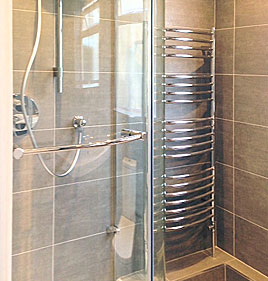 Bathroom shower and heated towel rail